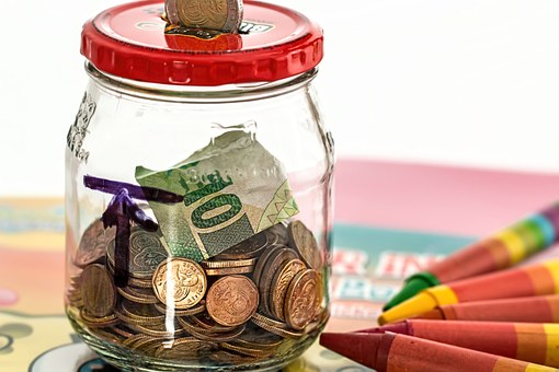 coins inside jar